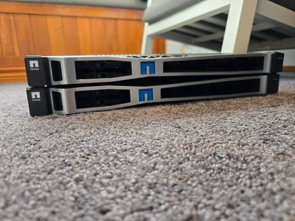 Pair of NetApp servers on a carpeted floor